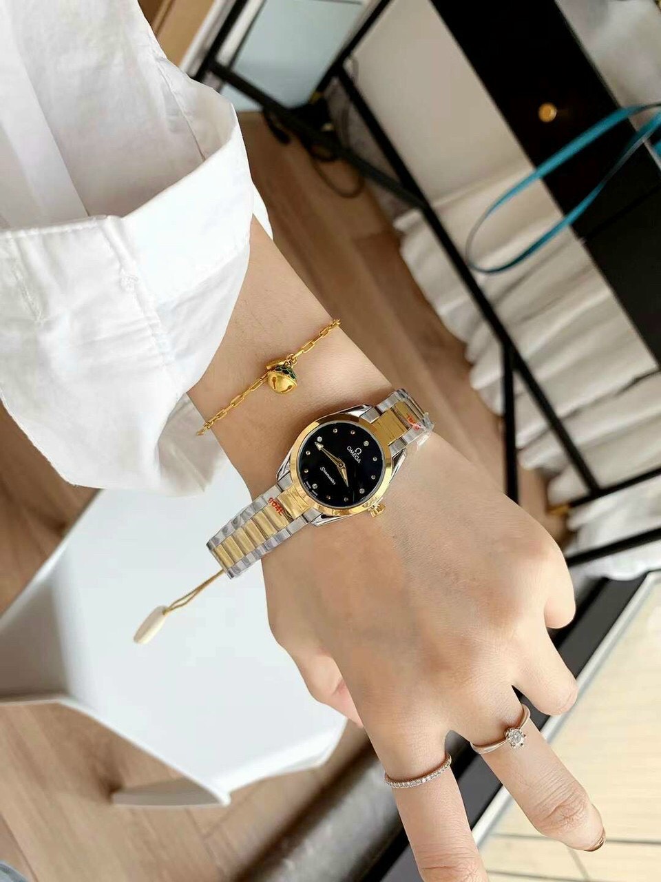 Đồng hồ Omega nữ dây kim loại Đồng hồ Omega nữ dây kim loại