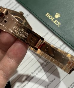 Đồng hồ Rolex Day-Date Replica 11 cọc số Ruby niềng đá baguette 40mm