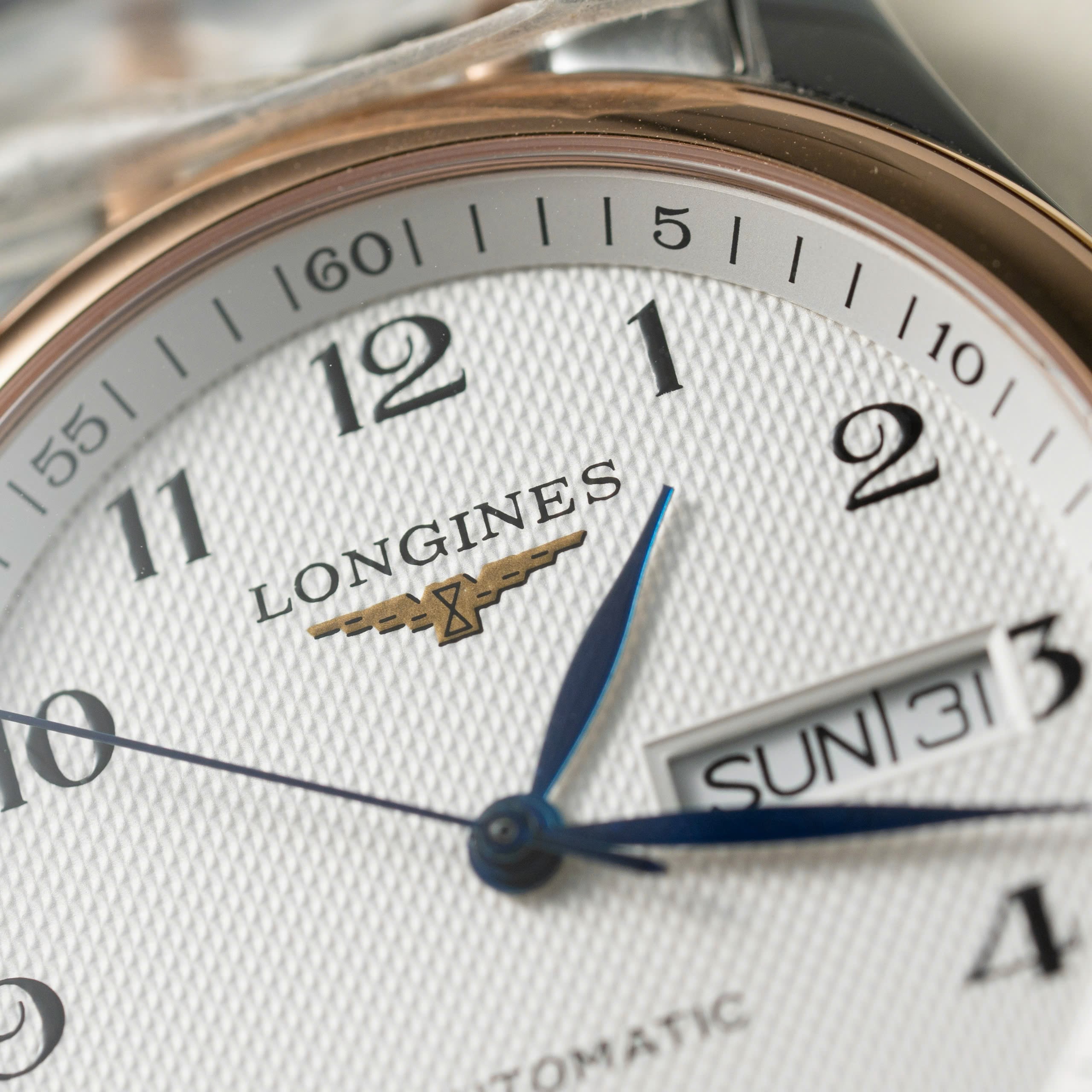 Đồng hồ Longines demi rose gold Rep 11 cao cấp mặt trắng 38 (10) Đồng hồ Longines demi rose gold Rep 11 cao cấp mặt trắng 38 (2)