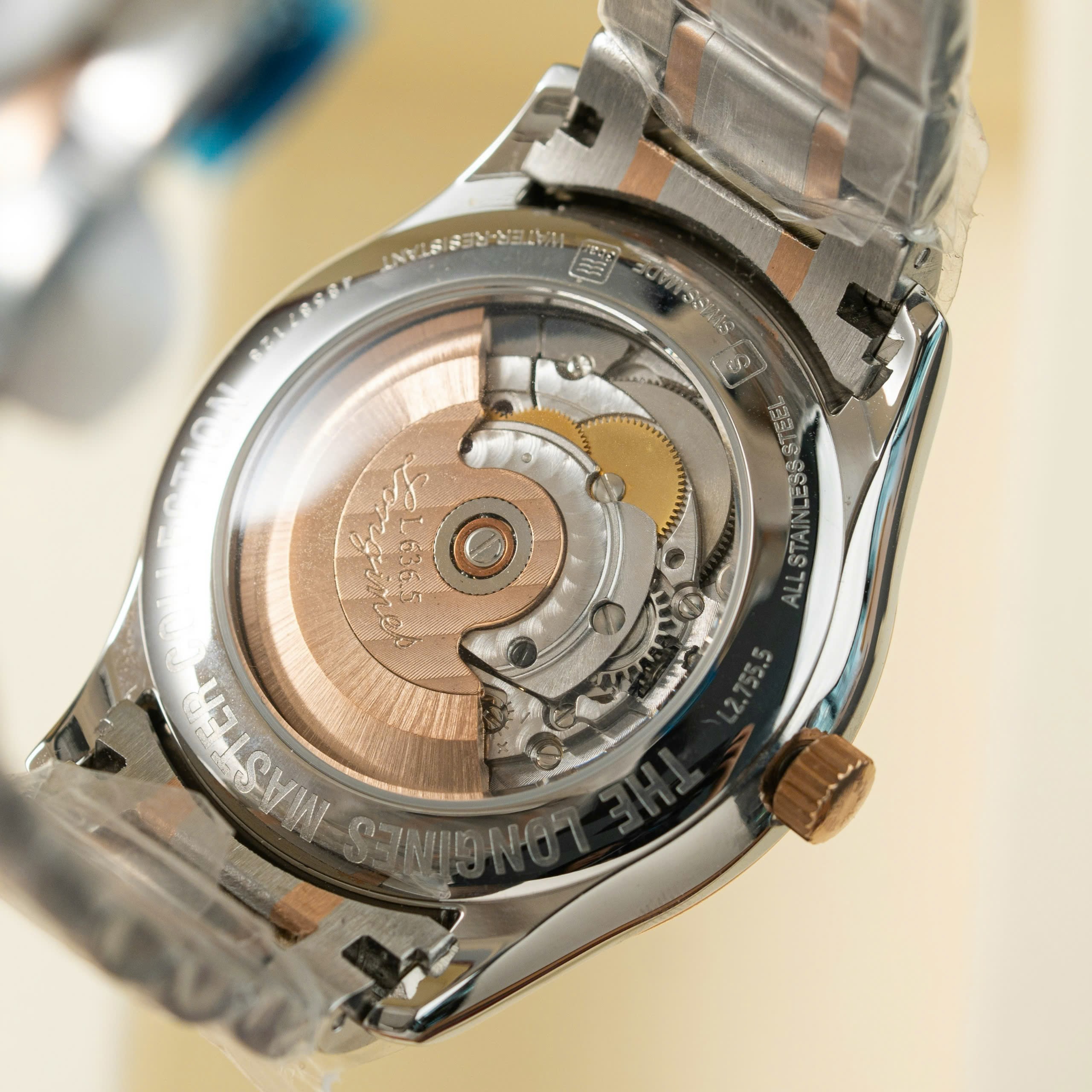 Đồng hồ Longines demi rose gold Rep 11 cao cấp mặt trắng 38 (4) Đồng hồ Longines demi rose gold Rep 11 cao cấp mặt trắng 38 (2)