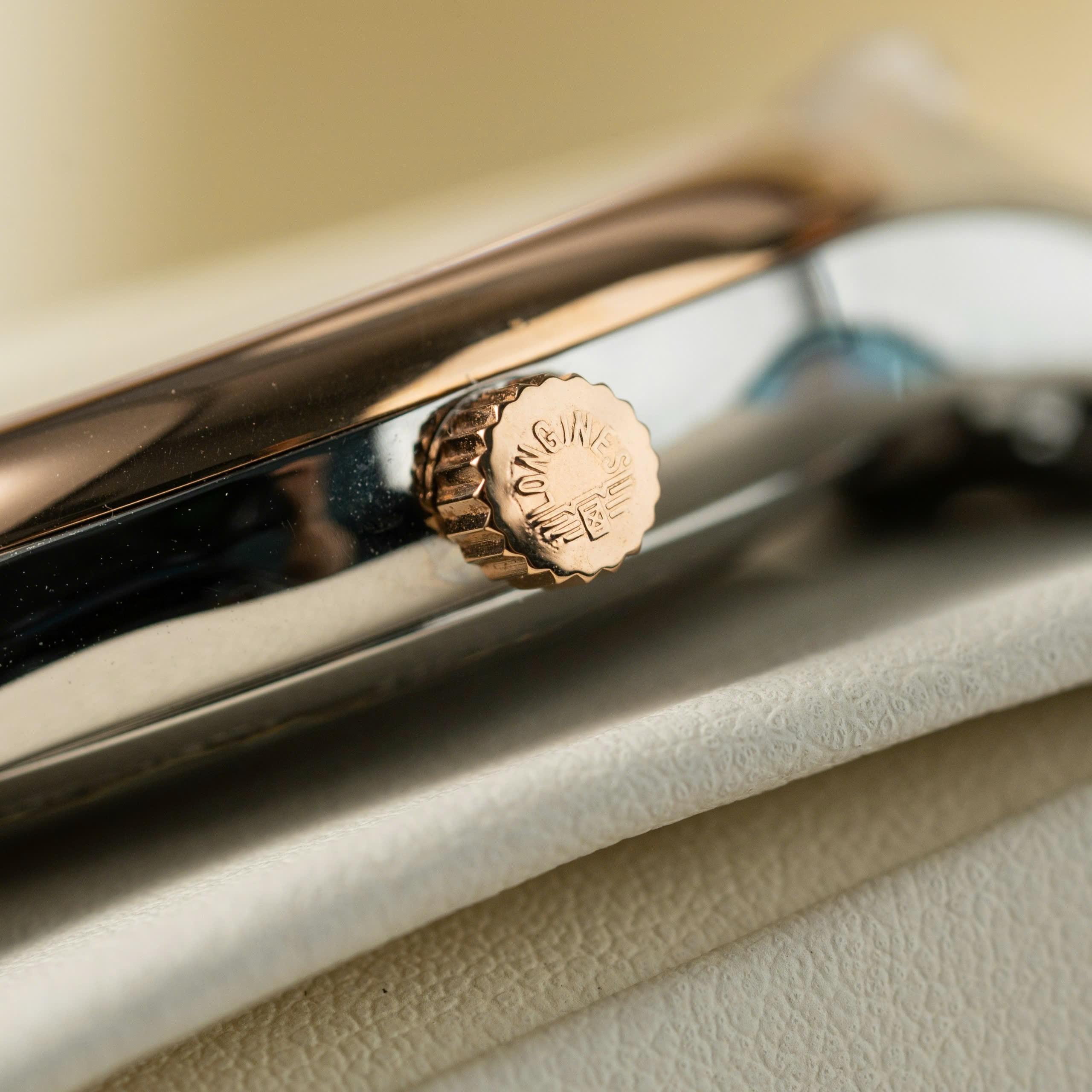 Đồng hồ Longines demi rose gold Rep 11 cao cấp mặt trắng 38 (5) Đồng hồ Longines demi rose gold Rep 11 cao cấp mặt trắng 38 (2)