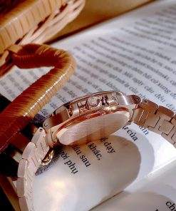 Đồng hồ Patek Philippe Nautilus nữ niềng đá mặt tím Fake cao cấp 35mm (4)