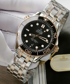 Đồng hồ Omega Seamaster Fake 11 Thuỵ Sỹ demi vàng hồng mặt đen 42mm (2)