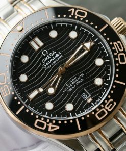 Đồng hồ Omega Seamaster Fake 11 Thuỵ Sỹ demi vàng hồng mặt đen 42mm (2)