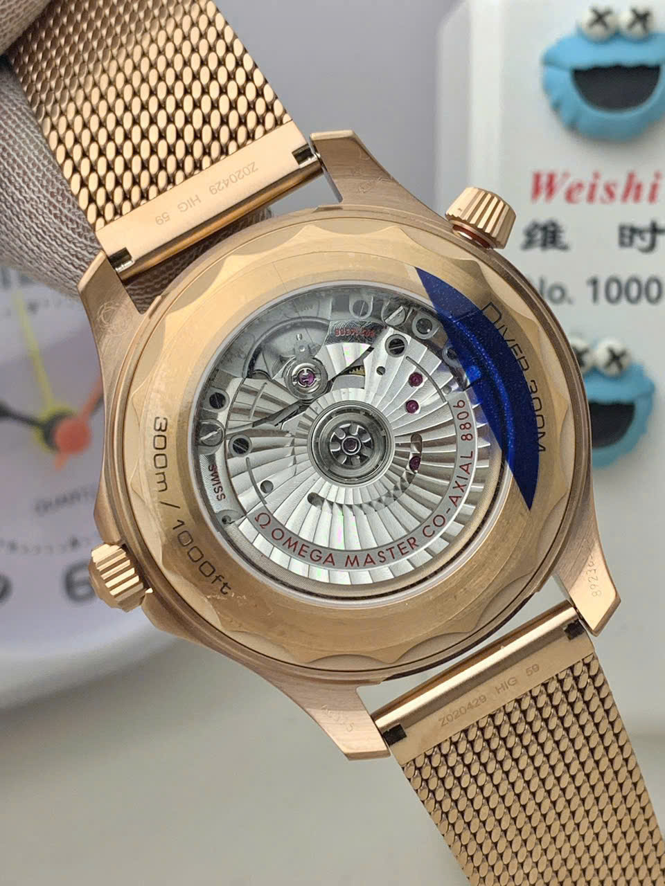 Đồng hồ Seamaster Diver 300M Bronze Gold chế tác cao cấp nhất viền đỏ nhà máy VS 42mm (3) Đồng hồ Seamaster Diver 300M Bronze Gold chế tác cao cấp nhất viền đỏ nhà máy VS 42mm