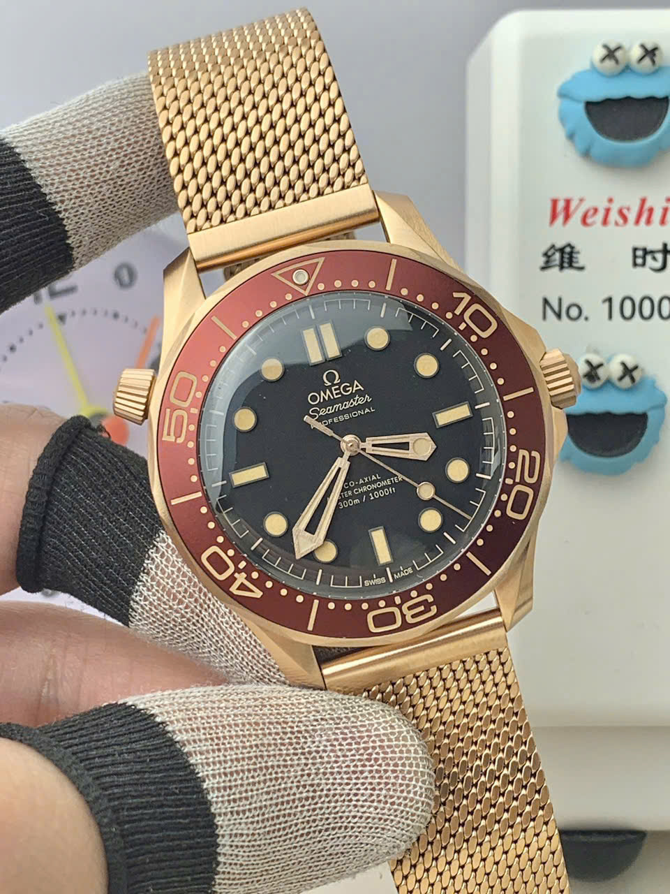 Đồng hồ Seamaster Diver 300M Bronze Gold chế tác cao cấp nhất viền đỏ nhà máy VS 42mm (5) Đồng hồ Seamaster Diver 300M Bronze Gold chế tác cao cấp nhất viền đỏ nhà máy VS 42mm