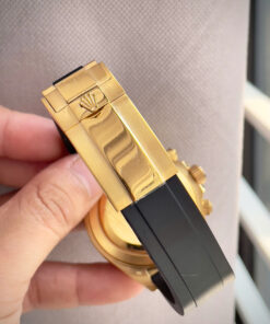 Đồng hồ Rolex Daytona Cosmograph vàng gold mặt đen cọc số học trò fake 11 40mm