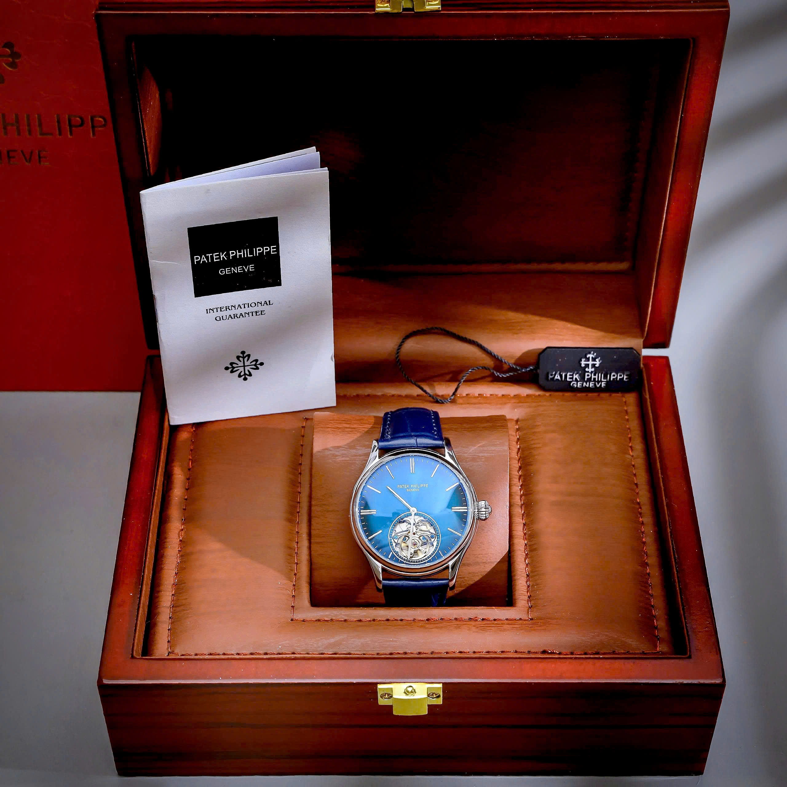 Đồng hồ Patek Philippe Genève nam xanh blue lộ cơ Tourbillon fake cao cấp 42mm (1) Đồng hồ Patek Philippe Genève nam xanh blue lộ cơ Tourbillon fake cao cấp 42mm