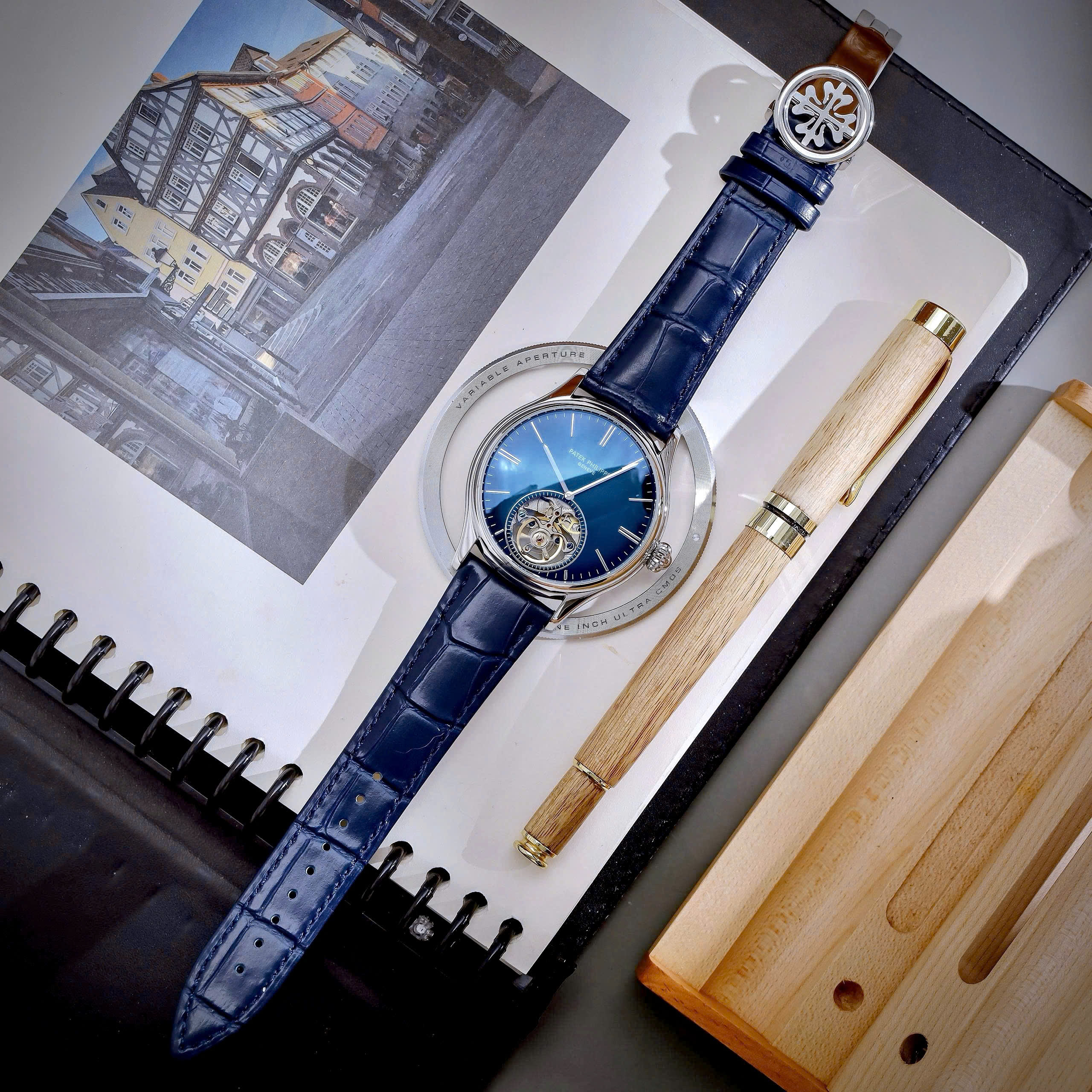 Đồng hồ Patek Philippe Genève nam xanh blue lộ cơ Tourbillon fake cao cấp 42mm (10) Đồng hồ Patek Philippe Genève nam xanh blue lộ cơ Tourbillon fake cao cấp 42mm