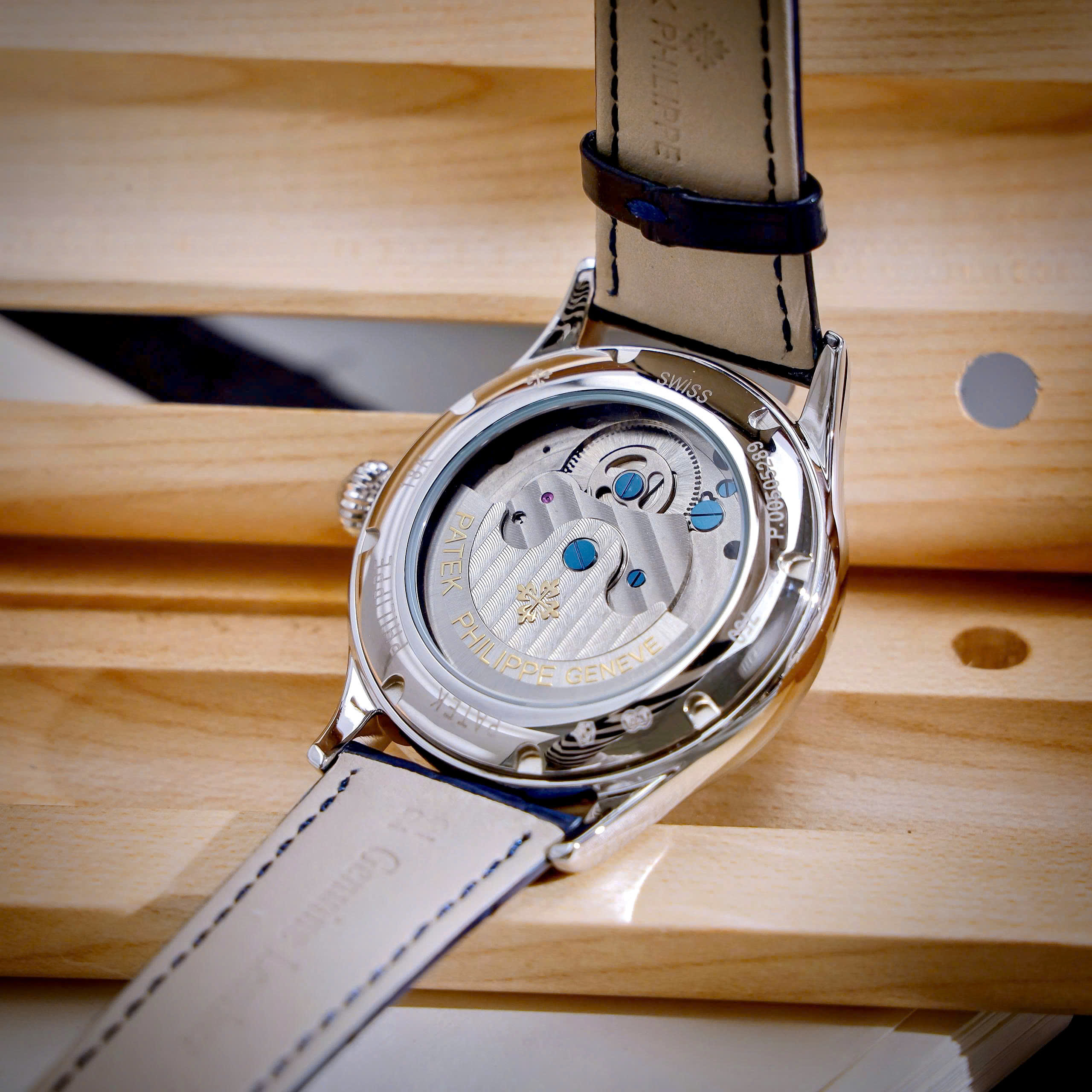 Đồng hồ Patek Philippe Genève nam xanh blue lộ cơ Tourbillon fake cao cấp 42mm (8) Đồng hồ Patek Philippe Genève nam xanh blue lộ cơ Tourbillon fake cao cấp 42mm