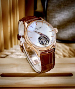 Đồng hồ Patek Philippe Genève nam vàng gold lộ cơ Tourbillon fake cao cấp 43mm